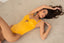 Underwire one-piece swimsuit with cutouts in sunset amber